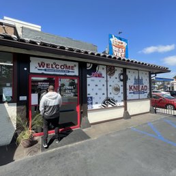 Exterior outside entrance of Knead Donuts & Vietnamese Coffee - Long Beach, California Exterior outside entrance of Knead Donuts & Vietnamese Coffee - Long Beach, California