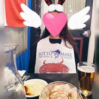 Sotto Mare - My friend modeling the Sotto Mare bib. - Seafood Near Me - San Francisco, California Sotto Mare - My friend modeling the Sotto Mare bib. - Seafood Near Me - San Francisco, California