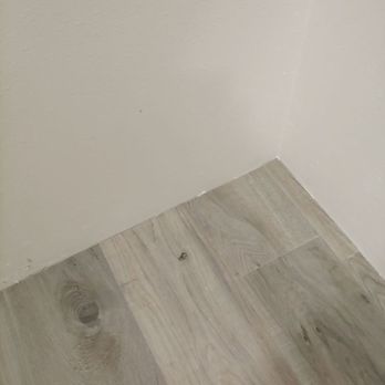 Great Floors - Vinyl tile installed wall to wall with zero relief causing it to buckle. - Carpeting Near Me - Seattle, Washington Great Floors - Vinyl tile installed wall to wall with zero relief causing it to buckle. - Carpeting Near Me - Seattle, Washington