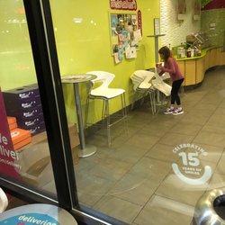 Menchie's Frozen Yogurt - Tables and chairs picked up so you cannot sit inside at 8:40 PM