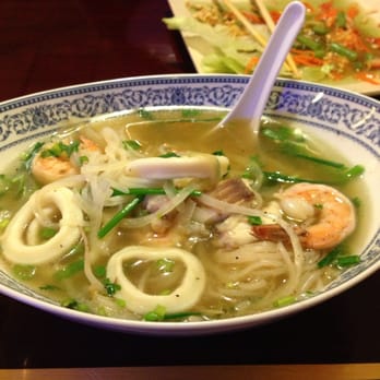 Pho Vn - #27 Seafood with rice noodles & the delicious papaya salad in the background. - Vietnamese Near Me - Boynton Beach, Florida Pho Vn - #27 Seafood with rice noodles & the delicious papaya salad in the background. - Vietnamese Near Me - Boynton Beach, Florida