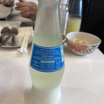 Nika Kitchen - a bottle of milk on a table - Persian/Iranian Near Me - Richmond Hill, Ontario Nika Kitchen - a bottle of milk on a table - Persian/Iranian Near Me - Richmond Hill, Ontario