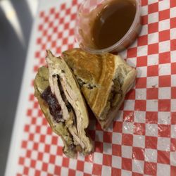 Tias Maine lobster rolls - Thanksgiving UFO sandwich our own smoked turkey breast with stuffing cranberry sauce and mayo heated in our ufo press