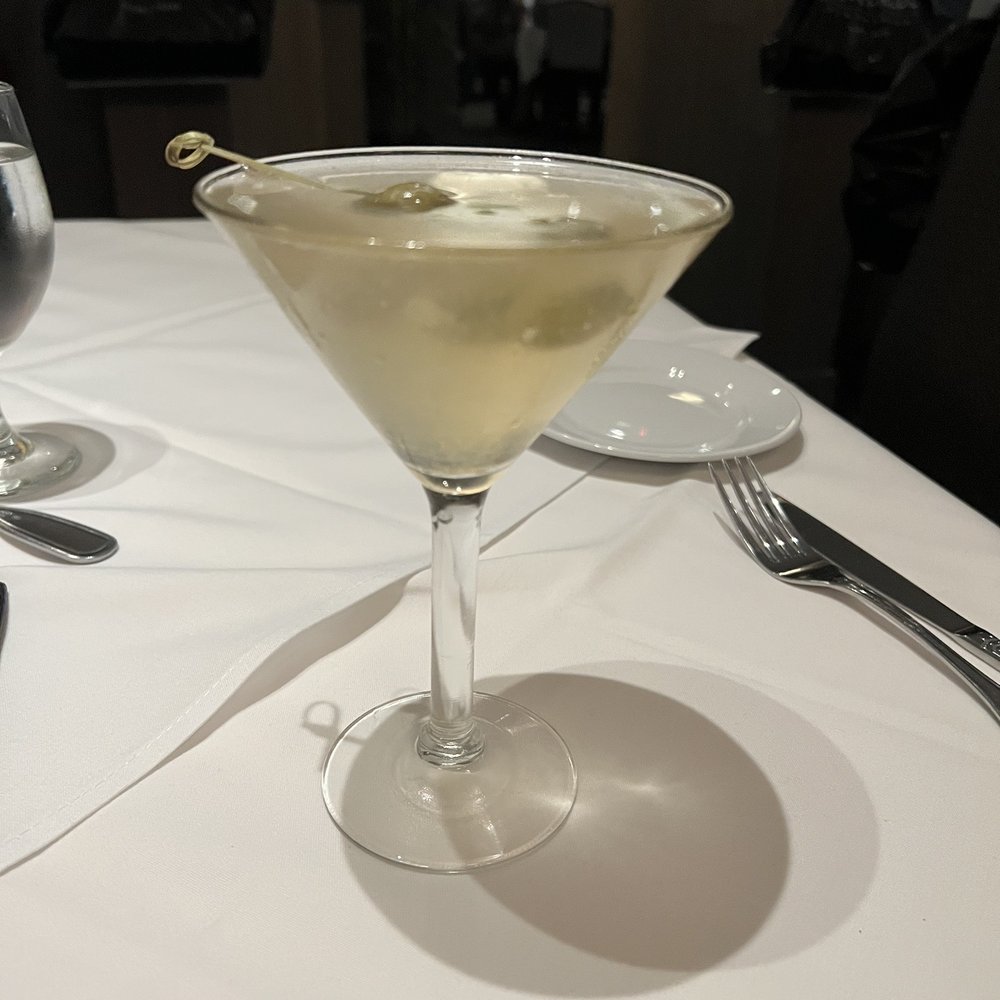 Steve Fields - Extra dirty martini with blue cheese stuffed olives - Steakhouses Near Me - Plano, Texas Steve Fields - Extra dirty martini with blue cheese stuffed olives - Steakhouses Near Me - Plano, Texas