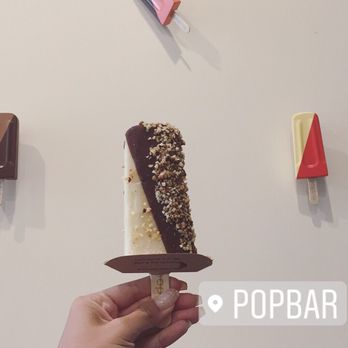 Popbar - Coconut PopSorbetto with dark chocolate and hazlenuts. - Gelato Near Me - Huntington Beach, California Popbar - Coconut PopSorbetto with dark chocolate and hazlenuts. - Gelato Near Me - Huntington Beach, California