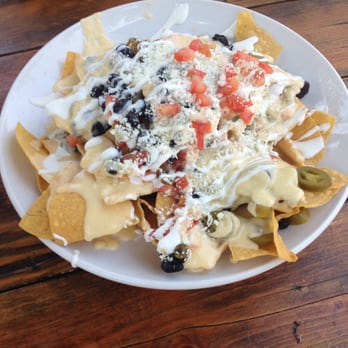 Plank - presenting nachos!!! fyi-jalepenos are sweet and not hot - Bowling Near Me - Oakland, California