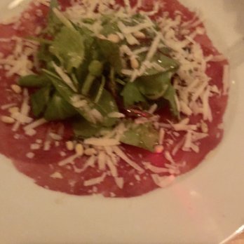Eetcafé Zusjes - Carpaccio appetizer with greens and pine nuts - Gastropubs Near Me - Amsterdam, New Hampshire