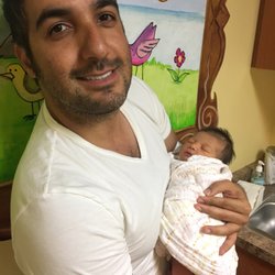 Michael S Yu, MD - Daddy with Baby on first visit to see Dr Yu