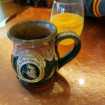 Another Broken Egg Cafe - The nice coffee mugs and a Brunch 'n More Bellini. - Breakfast & Brunch Near Me - Pembroke Pines, Florida Another Broken Egg Cafe - The nice coffee mugs and a Brunch 'n More Bellini. - Breakfast & Brunch Near Me - Pembroke Pines, Florida