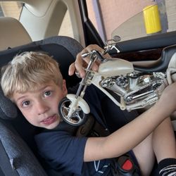 Willow's Antiques - It lights up and makes noise! He found it for $10 and was able to spend his chore money on something he was so excited for