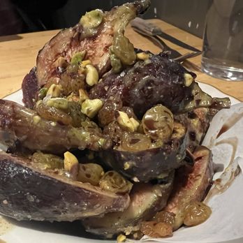 Folks Pizzeria - The seasonal FIG BOWL is a generous offering of ripe FIGS garnished with yellow raisins and pistachio with balsamic dressing. - Pizza Near Me - Costa Mesa, California Folks Pizzeria - The seasonal FIG BOWL is a generous offering of ripe FIGS garnished with yellow raisins and pistachio with balsamic dressing. - Pizza Near Me - Costa Mesa, California