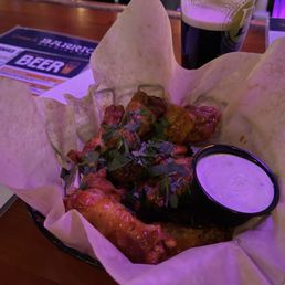 Bone-in chicken wings with cilantro tequila dip