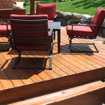 Next Generation Contracting - a deck with chairs and a table - General Contractors Near Me Next Generation Contracting - a deck with chairs and a table - General Contractors Near Me