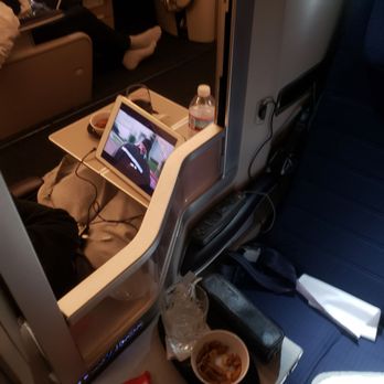 British Airways - 747 business class seat. Upper deck. Seats face into each other. Partition doesn't give privacy to strangers. - Airlines Near Me - West Drayton, XGL British Airways - 747 business class seat. Upper deck. Seats face into each other. Partition doesn't give privacy to strangers. - Airlines Near Me - West Drayton, XGL