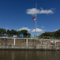 Spirit of the Water Yacht - Going thru the locks ( Flags at 1/2 )