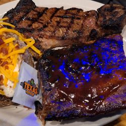 Texas Roadhouse - Steak and ribs with loaded baked potato