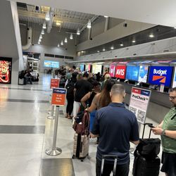 Budget Indianapolis Airport Rental Car - 8/15/25. Deja vu. A long line with two people working.