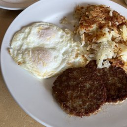 Eggs over medium with sausage patties Eggs over medium with sausage patties