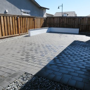 A1 Landscaping & Construction - All pavers and rocks with small corner bench seating. I will be putting my fire pit here - Landscaping Near Me - Lathrop, California