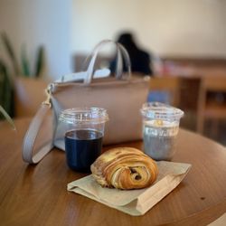 Coft - Black iced coffee, Sea Salt Hojicha, and pain au chocolat