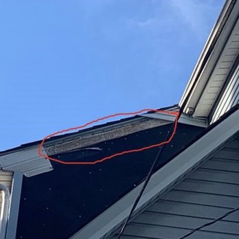 Rmk Construction - Before repair - Siding Near Me