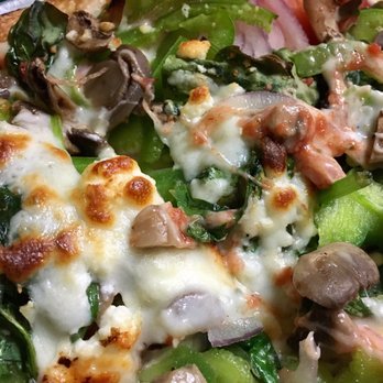 Bravo's - The Veggie Special!!! So delicious-- fresh garlic, onions, spinach, feta cheese, tomatoes, green peppers, mushrooms, pizza sauce, mozzarella - Italian Near Me - Freeville, New York