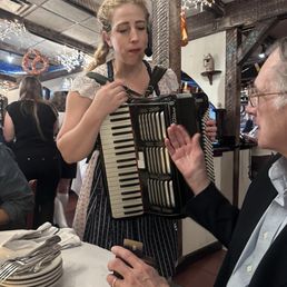 Vocalist and accordion player during octoberfest Vocalist and accordion player during octoberfest