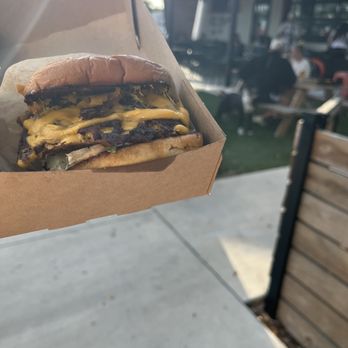 Tower 10 Burger - Tower 10 Burger with grilled onions, at a pop up food truck at Common Dialect Beerworks - Food Trucks Near Me