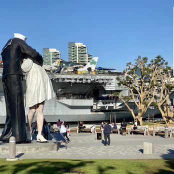 Embracing Peace - The Unconditional Surrender Statue stands in the shadow of the U.S.S. Midway - Landmarks & Historical Buildings Near Me - San Diego, California