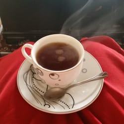Evil Eye Restaurant - In true Korean style,  "service" tea while I warm myself in front of their wood stove. :)