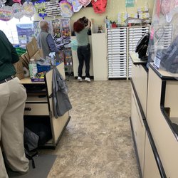 Dollar Tree - The employee to the left was the only one that was working the register. The employee at the balloons was making