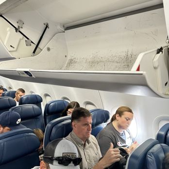Delta Air Lines - Empty bin space - Airlines Near Me - Detroit, Michigan