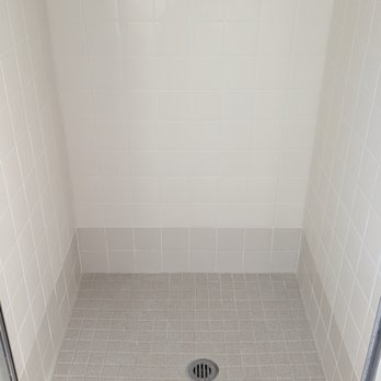 The Tile Solution - Shower, After photo 2: The cracks and missing grout lines are all filled perfectly. - Flooring Near Me - Mount Kisco, New York The Tile Solution - Shower, After photo 2: The cracks and missing grout lines are all filled perfectly. - Flooring Near Me - Mount Kisco, New York