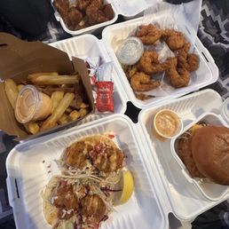 Shrimp tacos, fish burger, shrimp basket and chicken strips. Shrimp tacos, fish burger, shrimp basket and chicken strips.