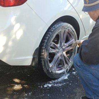 Biff's Automotive Detailing - Agitating the cleanser on the wheels - Auto Detailing Near Me