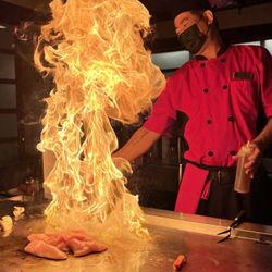 Shogun Japanese Steakhouse - Teppanyaki chef Nook doing what he does best. Great show!