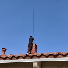 Vince cleaning the chimney. He found some cracks and explained to me how to repair it. He even helped me with installing a chimney cap. Vince cleaning the chimney. He found some cracks and explained to me how to repair it. He even helped me with installing a chimney cap.