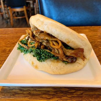 Momona - Oyster mushroom bao with delicious steamed and seasoned curly kale. My favorite item I ordered. Best bao I've ever had! - Ramen Near Me - Chico, California