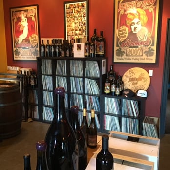 Sleight of Hand Cellars - Great selection of vinyl records in the tasting room. The vintage magician posters hung on the wall inspired the design of the wine labels. - Wine Tasting Room Near Me - Walla Walla, Washington Sleight of Hand Cellars - Great selection of vinyl records in the tasting room. The vintage magician posters hung on the wall inspired the design of the wine labels. - Wine Tasting Room Near Me - Walla Walla, Washington