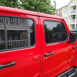 Black Optix Tint - Ceramic tint on the front roll down windows that match the back windows.