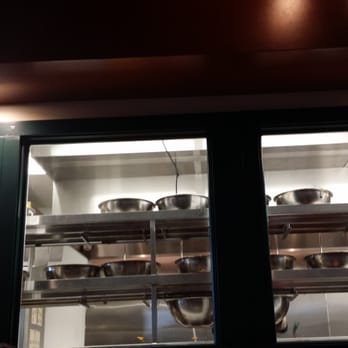 Wingstop - Window looking into the kitchen. - Chicken Wings Near Me - Hanford, California Wingstop - Window looking into the kitchen. - Chicken Wings Near Me - Hanford, California