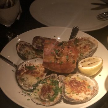 Prime One Twelve - Louisiana Style Char-grilled Oysters - Steakhouses Near Me - Miami Beach, Florida Prime One Twelve - Louisiana Style Char-grilled Oysters - Steakhouses Near Me - Miami Beach, Florida