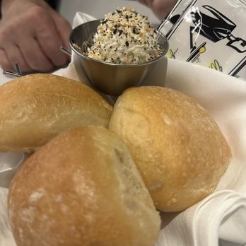 Dukes Chophouse - Warm rolls with whipped butter topped with everything seasoning - Lounges Near Me - Schenectady, New York