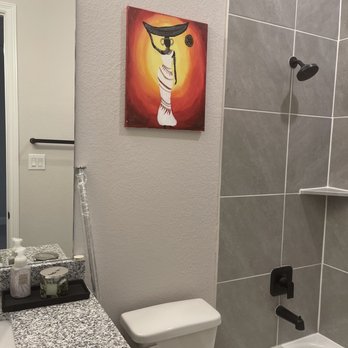 Luxurious Construction - a bathroom with a sink, toilet, and bathtub - General Contractors Near Me Luxurious Construction - a bathroom with a sink, toilet, and bathtub - General Contractors Near Me