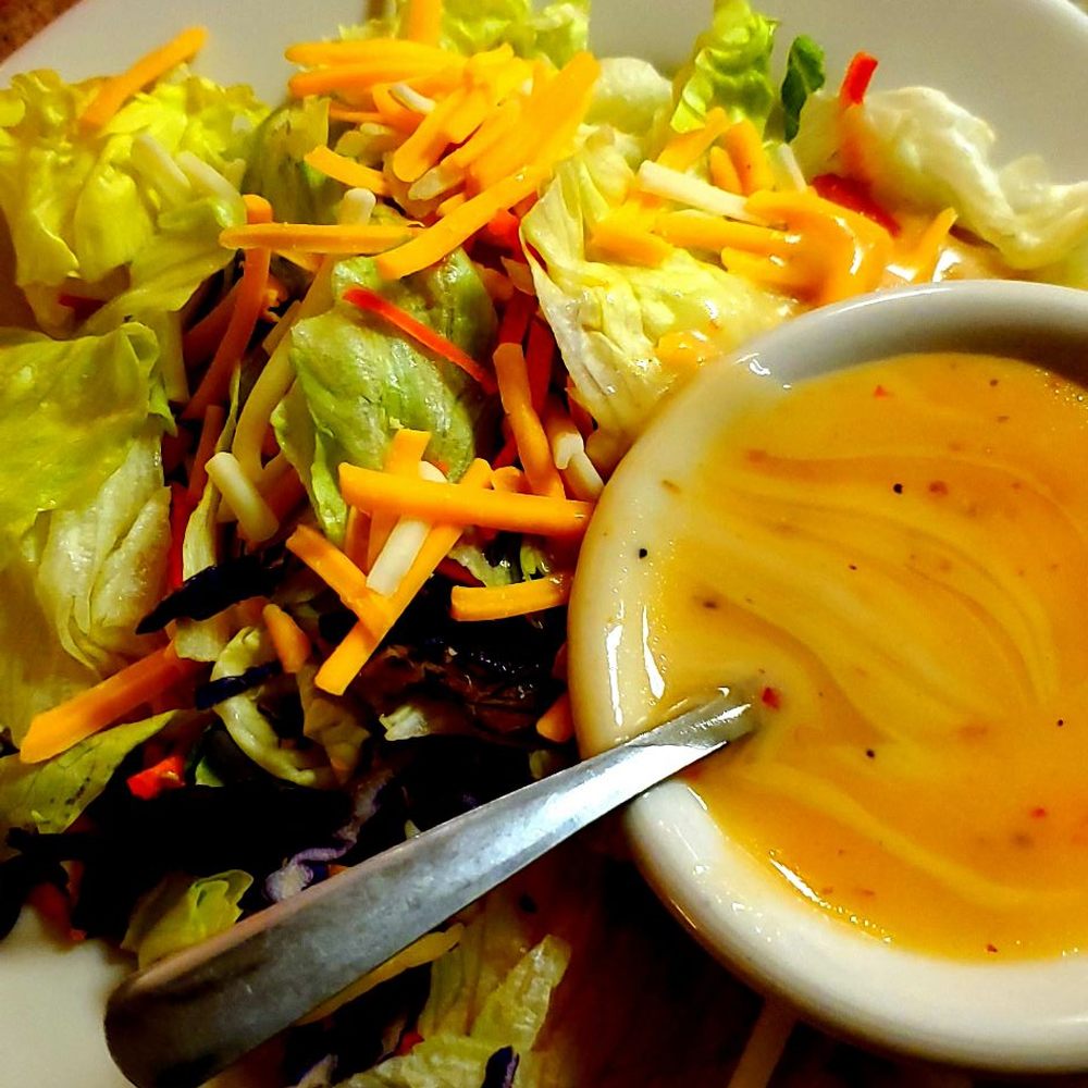Duffy's Restaurant - a plate of salad with dressing - American Near Me - Broken Arrow, Oklahoma