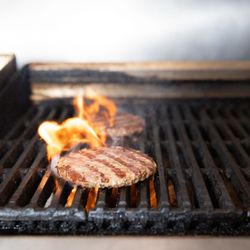 Brooklyn Bar and Grill - Grilling our Fresh 1/2 lb Burgers!  Yum!