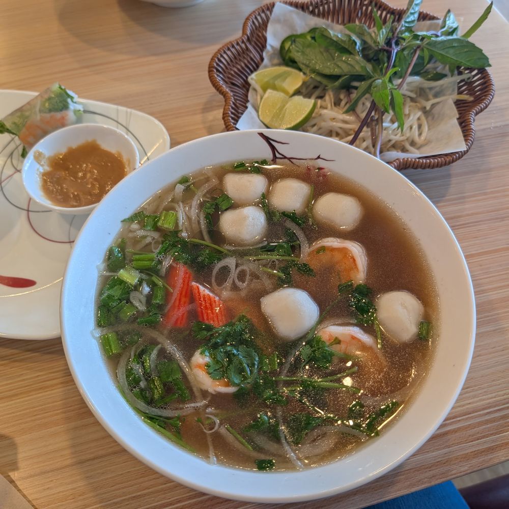SaiGon Nho - On the side plate, you'll see the spring roll. Front and center is the seafood pho. An amazing dish! - Vietnamese Near Me - Fairfield, California SaiGon Nho - On the side plate, you'll see the spring roll. Front and center is the seafood pho. An amazing dish! - Vietnamese Near Me - Fairfield, California