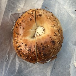 Pauli's Deli & Bagels - Everything bagel toasted with scallions cream cheese.