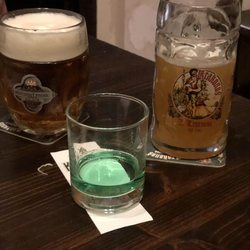 Restaurace U Dřevěného vlka - Beer servings plus a shot of absinth