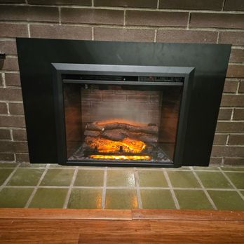 Total Quality Express - New electric fireplace Kirkland - Flooring Near Me - Renton, Washington